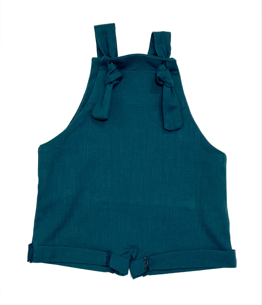Handmade in Coffs Harbour, NSW, Australia, these Prussian blue overalls have been thoughtfully designed for growing children. Made with a gusset crutch, extra length in the legs so they can be rolled for prolonged wear, and adjustable tie shoulder straps.