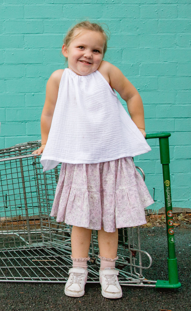 Made for fun and perfect for both dressy and casual occasions. 

Handmade in Coffs Harbour, NSW, these tie-top swing tops have been thoughtfully designed for growing children, with a fully adjustable neckline.

Our handmade swing tie tops are made with a soft white muslin that will just get better with wear and age.