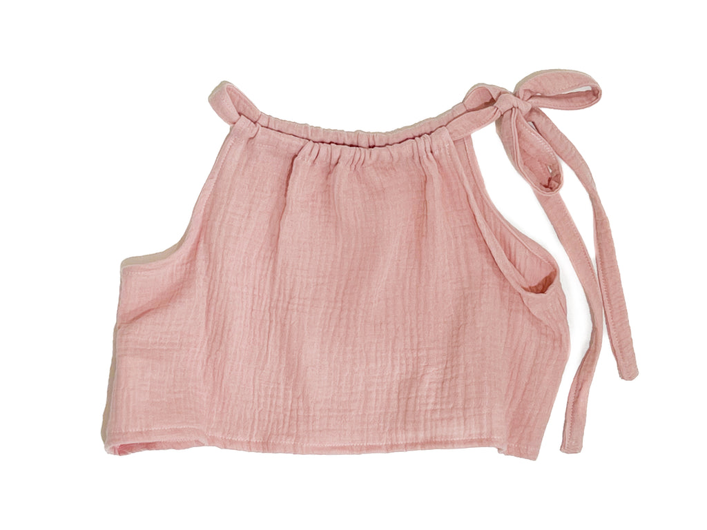 Made for fun and perfect for both dressy and casual occasions. 

Handmade in Coffs Harbour, NSW, these tie-top swing tops have been thoughtfully designed for growing children, with a fully adjustable neckline.

Our handmade swing tie tops are made with a soft pink ‘primrose’ muslin that will just get better with wear and age.